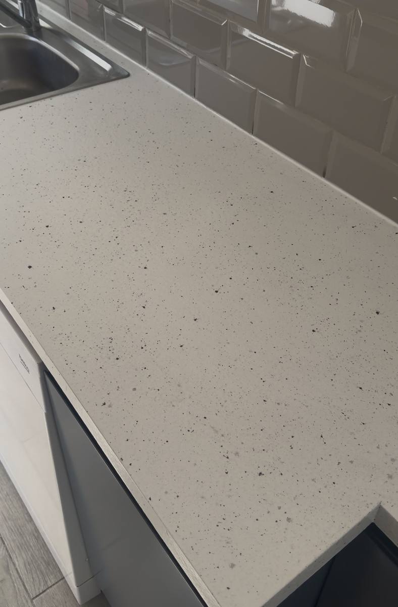 The same worktop refinished in Spray Granite, colour Nordic
